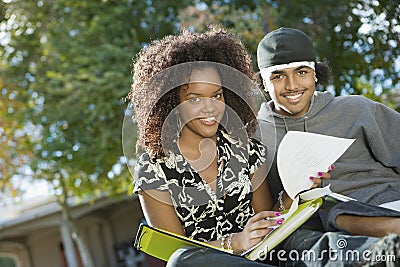 Students Studying On College Campus