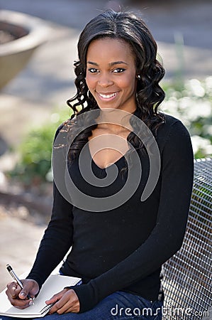 Stunning young African American female student on campus