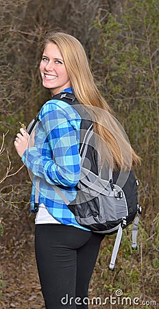 http://thumbs.dreamstime.com/x/stunning-young-woman-hiking-winter-beautiful-blonde-blue-plaid-flannel-shirt-cool-weather-backpack-walking-away-39046491.jpg