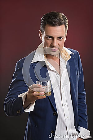 Stylish man drinking alcohol