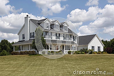 Suburban home with blue shutters and porch