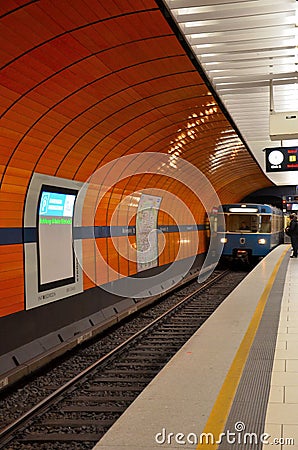 Subway train pulls into station: Munich, Germany