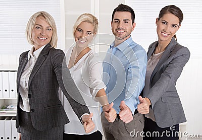 Successful business team in portrait: more woman as men with thu