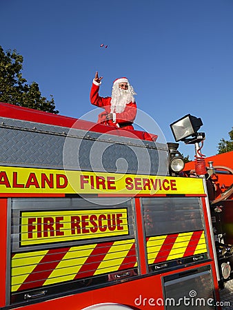 Summer Christmas: santa on fire truck