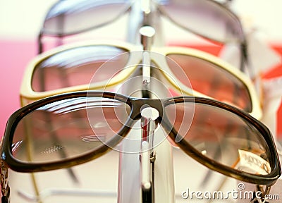 Sun glasses.close up shades and sunglasses in optician s shop