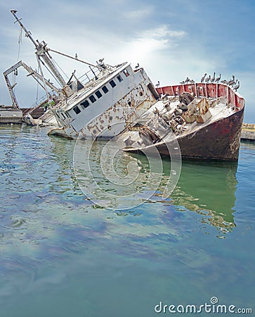 Sunken boat at the dock