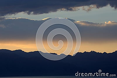 Sunset glow with snow mountains