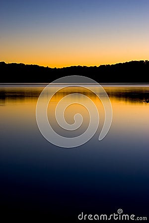 Sunset on lake reflection