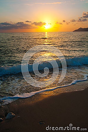 Sunset on the sea horizon, evening wave