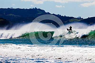 Surfboard surfer riding big wave ocean surf