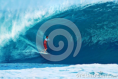 Surfer Damien Hobgood Surfing Pipeline in Hawaii