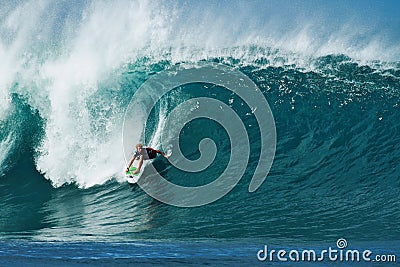 Surfer John Florence Surfing Pipeline in Hawaii