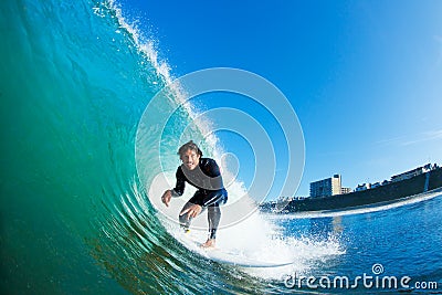 Surfer racing Amazing Wave