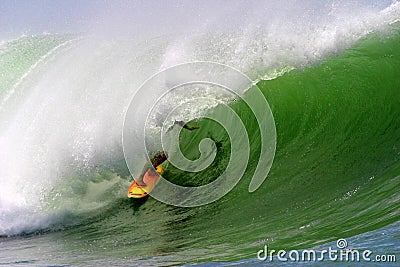 Surfer Surfing an Ocean Wave