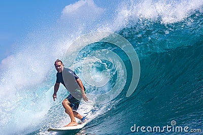 Surfing a Wave.GLand Surf Area.Indonesia.