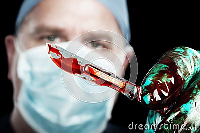 Surgeon with scalpel