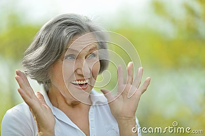 Surprised elder woman