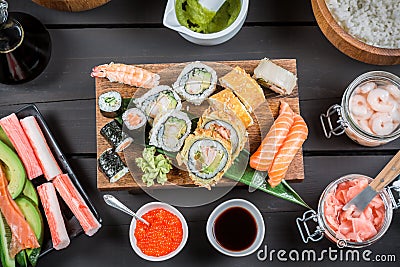 Sushi surrounded by fresh ingredients
