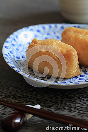 Sushi wrapped in fried bean curd