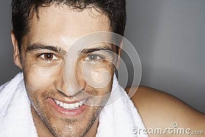 Sweaty Young Man With Towel Aroung Neck