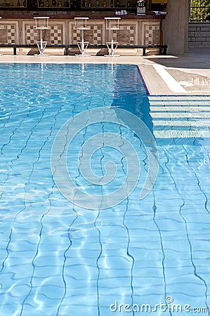 Swimming pool with bar