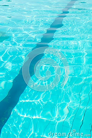 Swimming pool full of light blue water