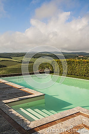 Swimming pool and green field,Tuscany,Italy