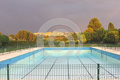 Swimming pool and the skyline of Toledo,Spain