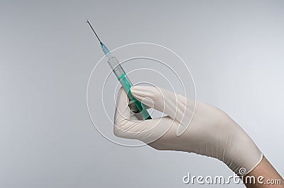 Syringe hand in glove