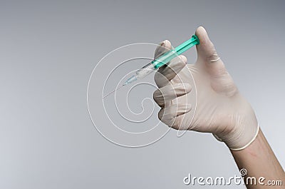 Syringe hand in glove