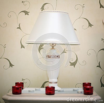 Table lamp in hotel with chandles