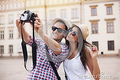 Taking photo of themselves