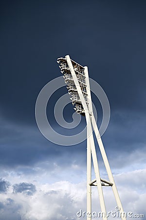 Stadium Lighting Tower and Cloudy Sky