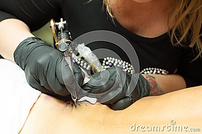 Tattoo artist at work