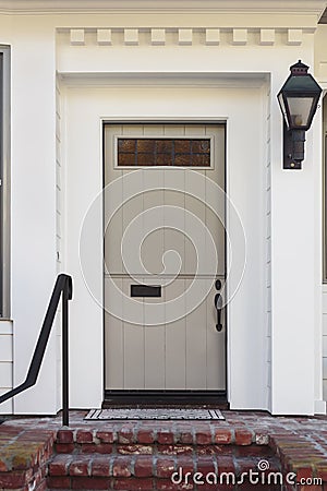 Taupe front door of modern home