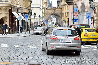 Taxi car in old district of Prague city