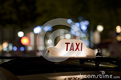 Taxi sign on car roof