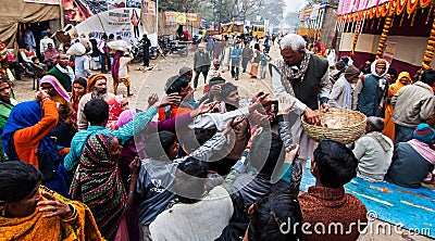 Tea distributed to Hindu devotees at transit camp