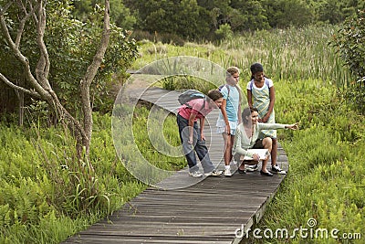 Teacher With Children On Field Trip