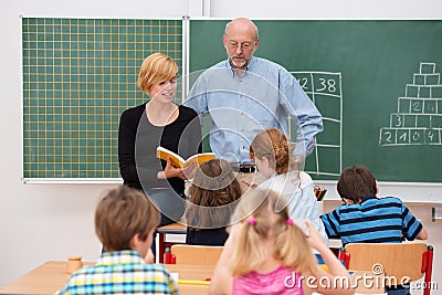 Teacher with his teaching assistant