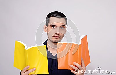 Teacher looking amazed at the books raising his eyebrow with suspicion.