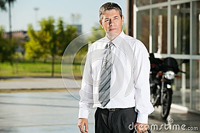 Teacher Looking Away While At College Campus