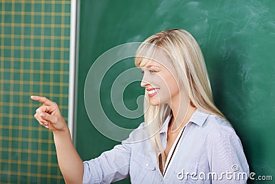 Teacher pointing on someone in the classroom