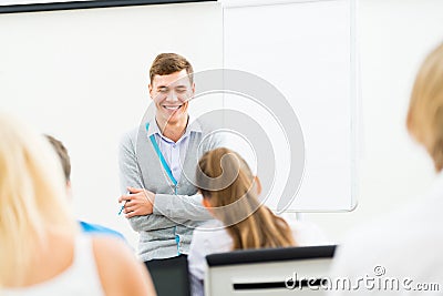 Teacher talking with students