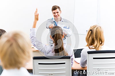 Teacher talking with students