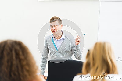 Teacher talking with students