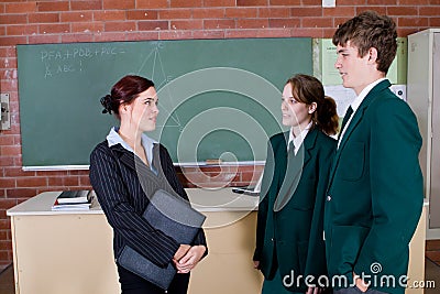 Teacher talking to students