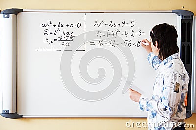 Teacher teaching algerbra
