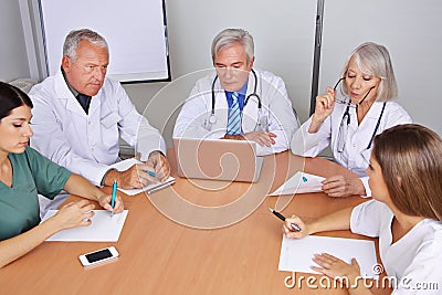 Team of doctors in a group meeting