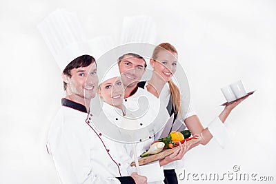Team of happy chefs